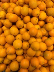 lots of ripe orange for eating as background
