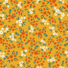Vintage pattern. Small white and orange flowers. green leaves. orange background. Seamless vector template for design and fashion prints.