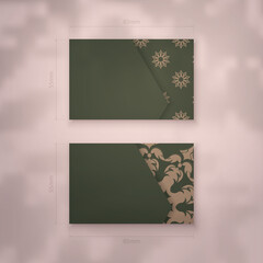 Presentable business card in green with vintage brown pattern for your brand.