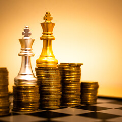 Chess board game to represent the business strategy with competition in the world market. and find out the best solution to meet target objective and goal. Sign and symbol of challenging as concept.	