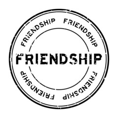 Grunge black friendship word round rubber seal stamp on white background