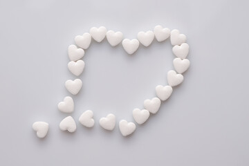 damaged heart made up of little hearts of pills