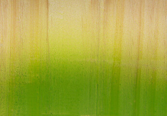 wood painted with colored spray paint black green