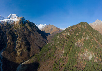 Scenic autumn mountain landscape with snow peaks, Tuymazinsky glacier, Digor Gorge, Northern Ossetia, Caucasus, Russia