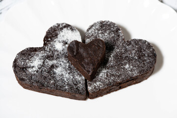 heart shaped brownie cakes on white plate