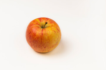 red ripe juicy apples on white