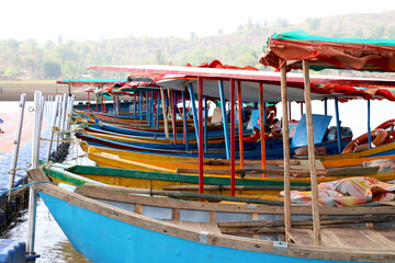 Fototapeta na wymiar Wooden Boat (ferry) tourist attraction at lake of dudhni at Gujarat- India