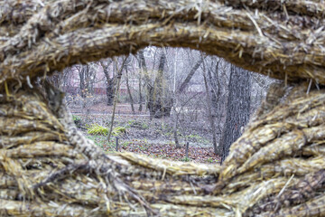 Straw plaited in braids as a decorative element of a garden or backyard