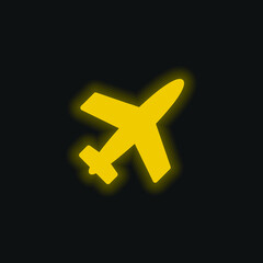 Obraz premium Airplane Filled Shape yellow glowing neon icon
