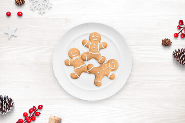 Christmas cookies on a plate. Top view, composition of kitchen table with decorations