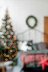 beautiful cozy bedroom decorated for Christmas, blurred image for background