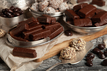 New Year's Eve table full of chocolates for children. Chocolate candy isolated 