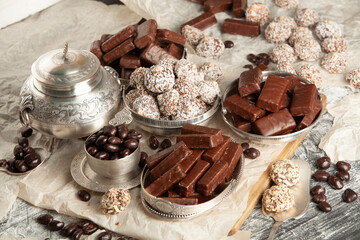 New Year's Eve table full of chocolates for children. Chocolate candy isolated 