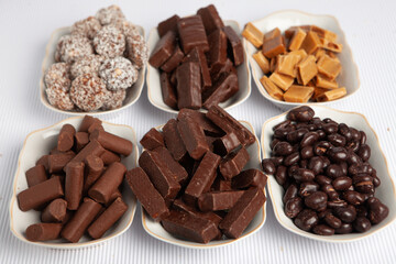 Assortment of delicious chocolate candies background. Chocolate candy isolated 