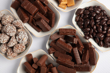Assortment of delicious chocolate candies background. Chocolate candy isolated 