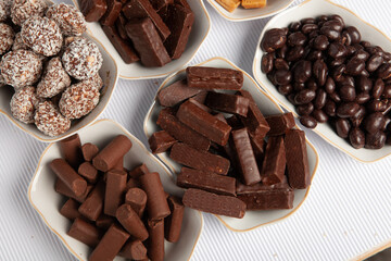 Assortment of delicious chocolate candies background. Chocolate candy isolated 