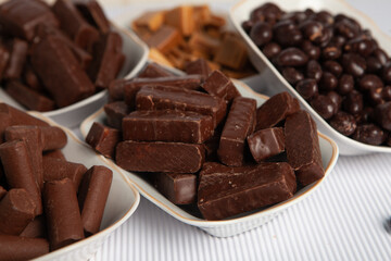 Assortment of delicious chocolate candies background. Chocolate candy isolated 