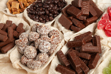 Assortment of delicious chocolate candies background. Chocolate candy isolated 