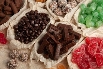 Assortment of delicious chocolate candies background. Chocolate candy isolated 