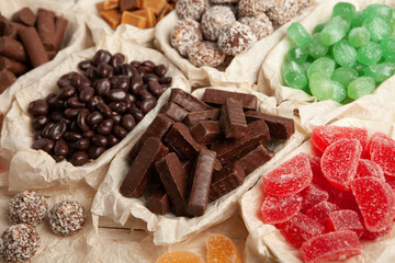Assortment of delicious chocolate candies background. Chocolate candy isolated 