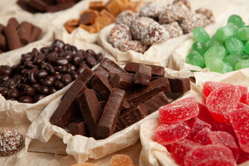 Assortment of delicious chocolate candies background. Chocolate candy isolated 