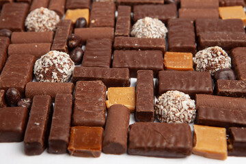 Assortment of delicious chocolate candies background. Chocolate candy isolated 