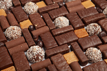Assortment of delicious chocolate candies background. Chocolate candy isolated 