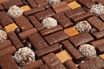 Assortment of delicious chocolate candies background. Chocolate candy isolated 