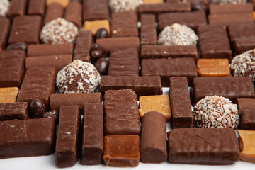 Assortment of delicious chocolate candies background. Chocolate candy isolated 