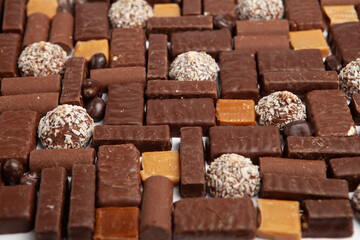 Assortment of delicious chocolate candies background. Chocolate candy isolated 