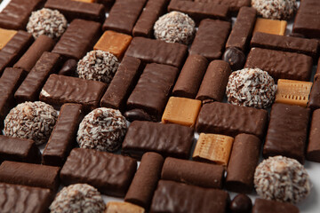 Assortment of delicious chocolate candies background. Chocolate candy isolated 