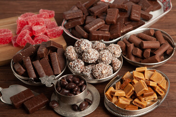 Assortment of delicious chocolate candies background. Chocolate candy isolated 