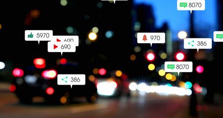 Image of social media icons and numbers over road traffic and cityscape