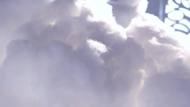 Video panning white synthetic clouds in the sun