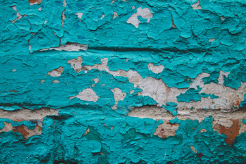 old blue painted wall cracked paint