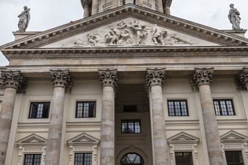 Architectural fragments of New Church (Neue Kirche or Deutscher Dom, 1708) at the Gendarmenmarkt across from French Church. Berlin, Germany.