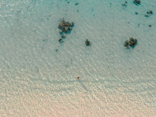 A crystal clear water on Pink Beach Labuan Bajo