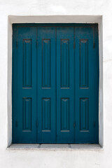 Blue door of a traditional Greek house on Symi island in Greece