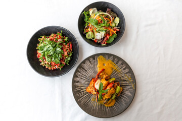 chicken meat with grilled vegetables and sauce
