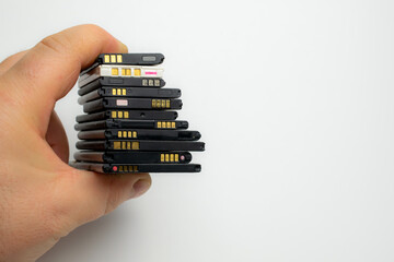 cell phone batteries. stacked. battery recycling. recovery of copper, gold, lithium
