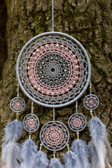 Handmade dream catcher with feathers threads and beads rope hanging
