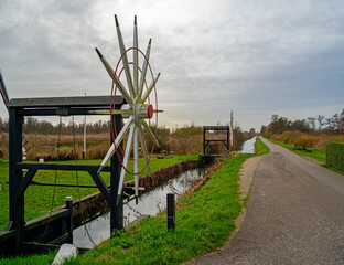 Manually operated weirs in a canal in the Netherlands
