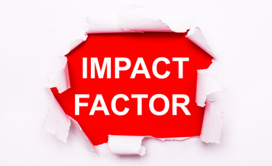 Torn white paper lies on a red background. On red, the text is white IMPACT FACTOR