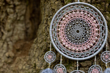 Handmade dream catcher with feathers threads and beads rope hanging