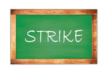 Fototapeta premium STRIKE text written on green school board.