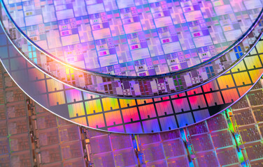 Silicon Wafers with microchips used in electronics for the fabrication of integrated circuits