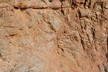 the beautiful whimsical texture of the rock as a result of weathering. Stone background.