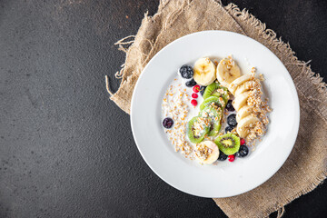 oatmeal porridge fruit meal snack on the table copy space food background