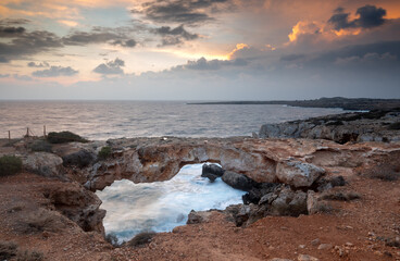 Fototapeta na wymiar Seascape with windy waves during stormy weather at sunset. Cape greko Cyprus