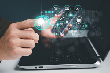 A businessman demonstrates the notion of cloud computing using a schematic of Network Data Storage Technology Service.